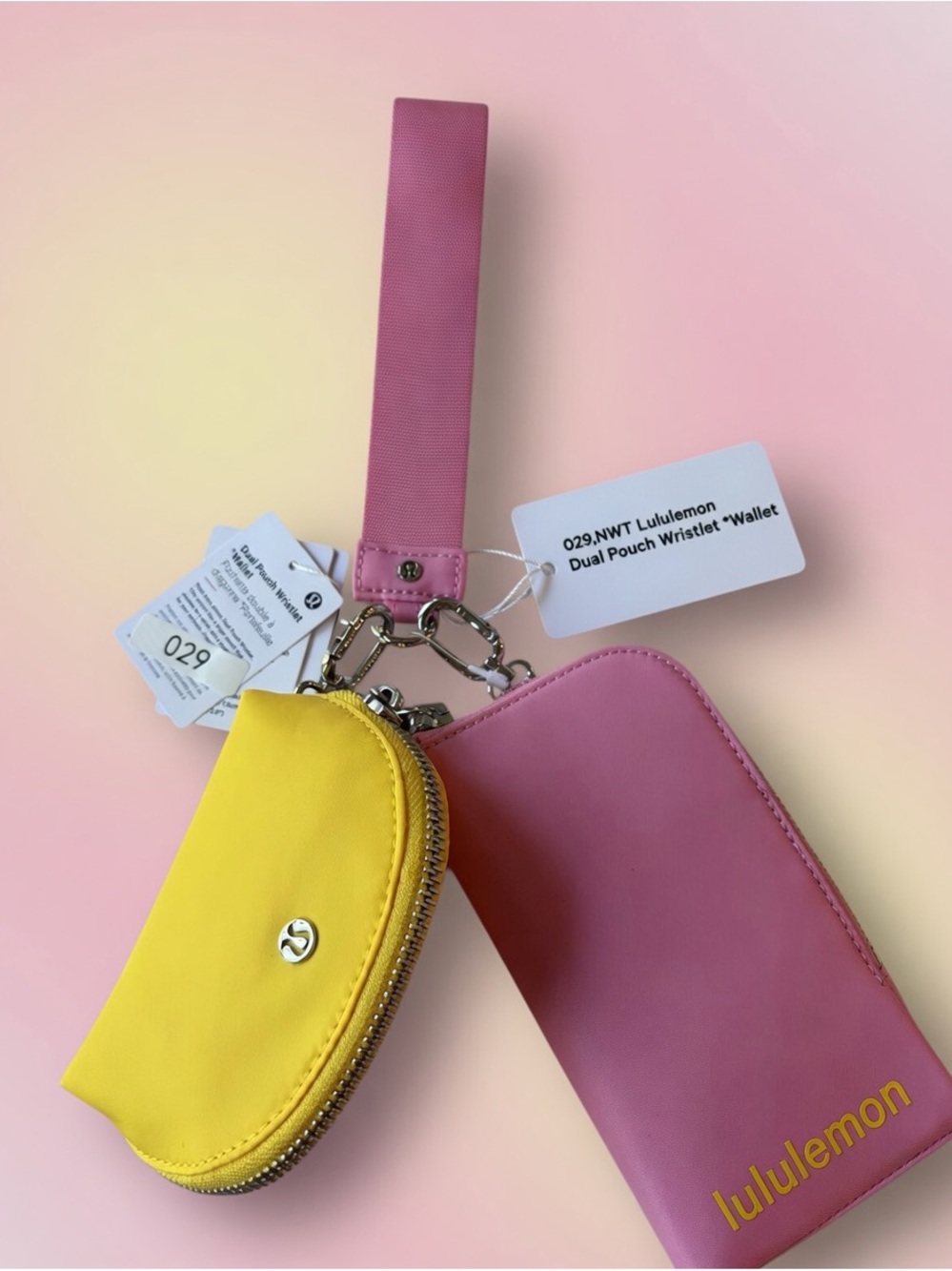 029,NWT Authentic lululemon pink and yellow dual pouch wristlet *Wallet.